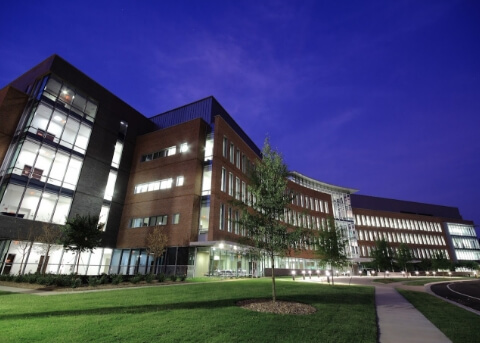 Multistoried university building at night